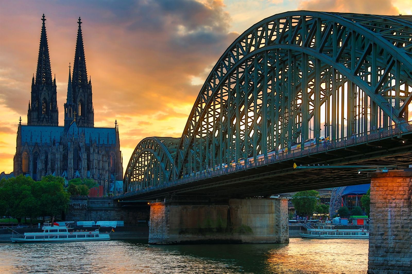 Cologne Cathedral and the Hohenzollern Bridge at sunset
