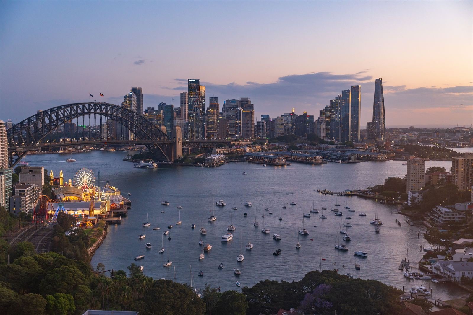 Sydney Harbour Bridge and the city skyline at dusk